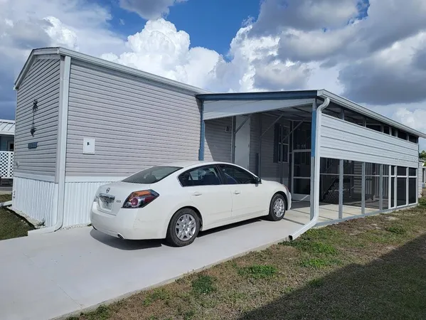 a car parked in front of a house