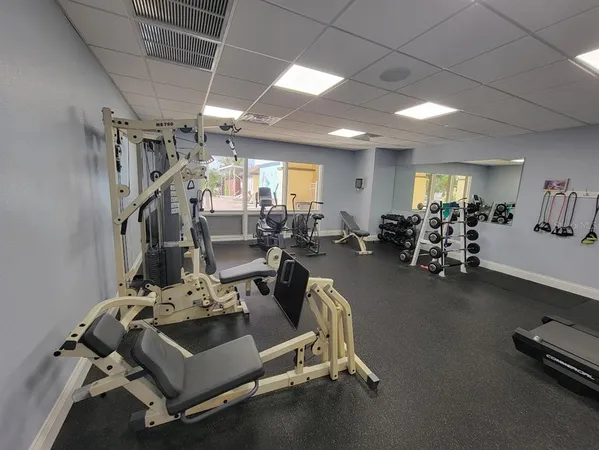 a view of a room with gym equipment