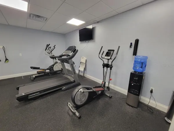 a view of a room with gym equipment