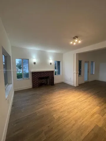 a view of kitchen and natural light