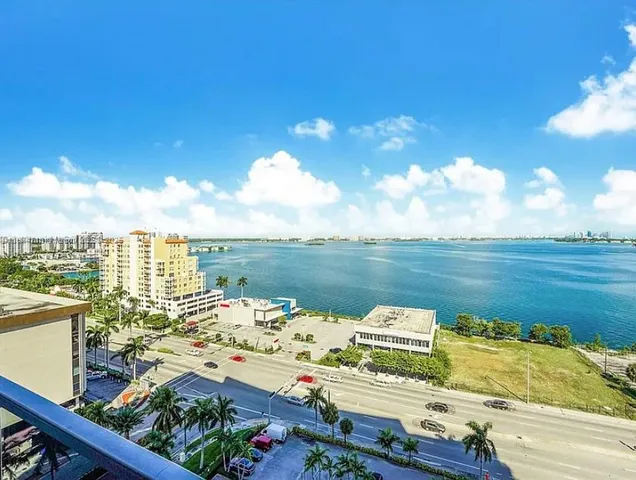 a view of a lake from a balcony