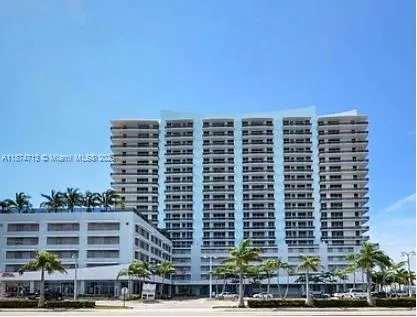 a view of a building with a street