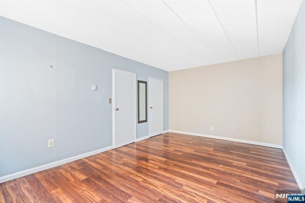 300 Lookout Avenue, Unit C4 Hackensack, NJ 07601 - Photo 17 of 18 a view of a room with wooden floor