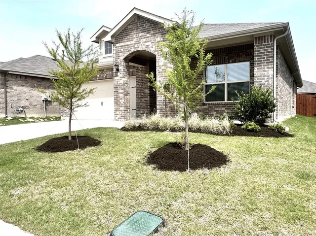 a front view of a house with entertaining space