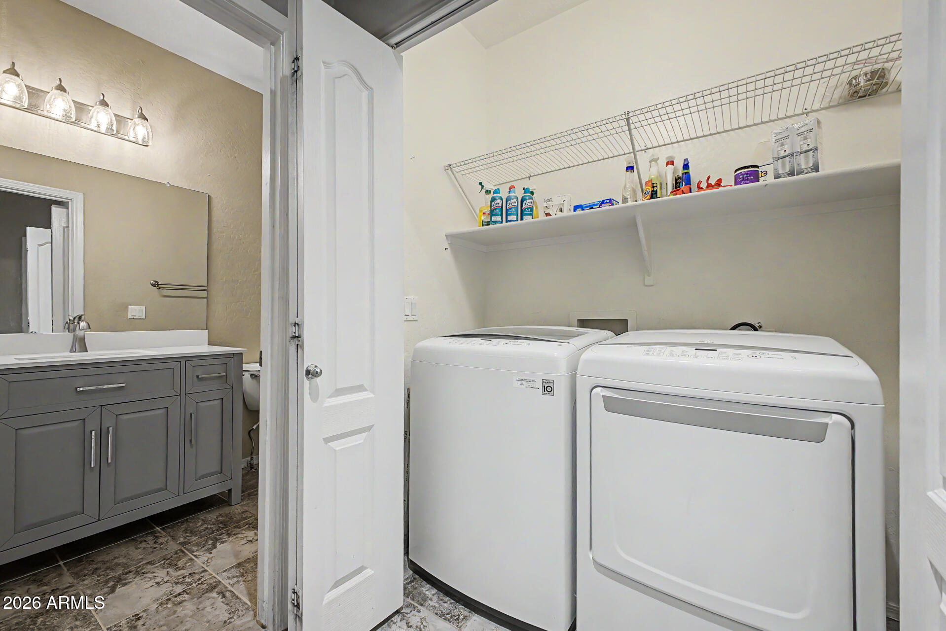 2600 East Springfield Place, Unit 109 Chandler, AZ 85286 - Photo 23 of 38 a utility room with dryer and washer