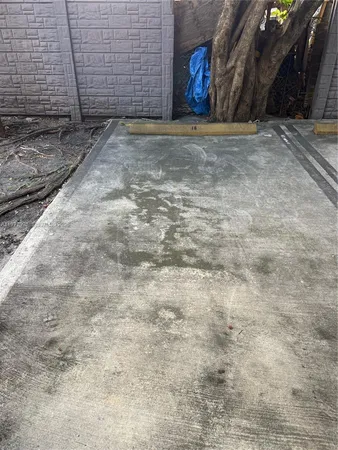 a view of balcony with wooden floor