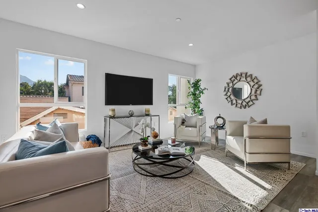 a bathroom with a toilet sink and shower