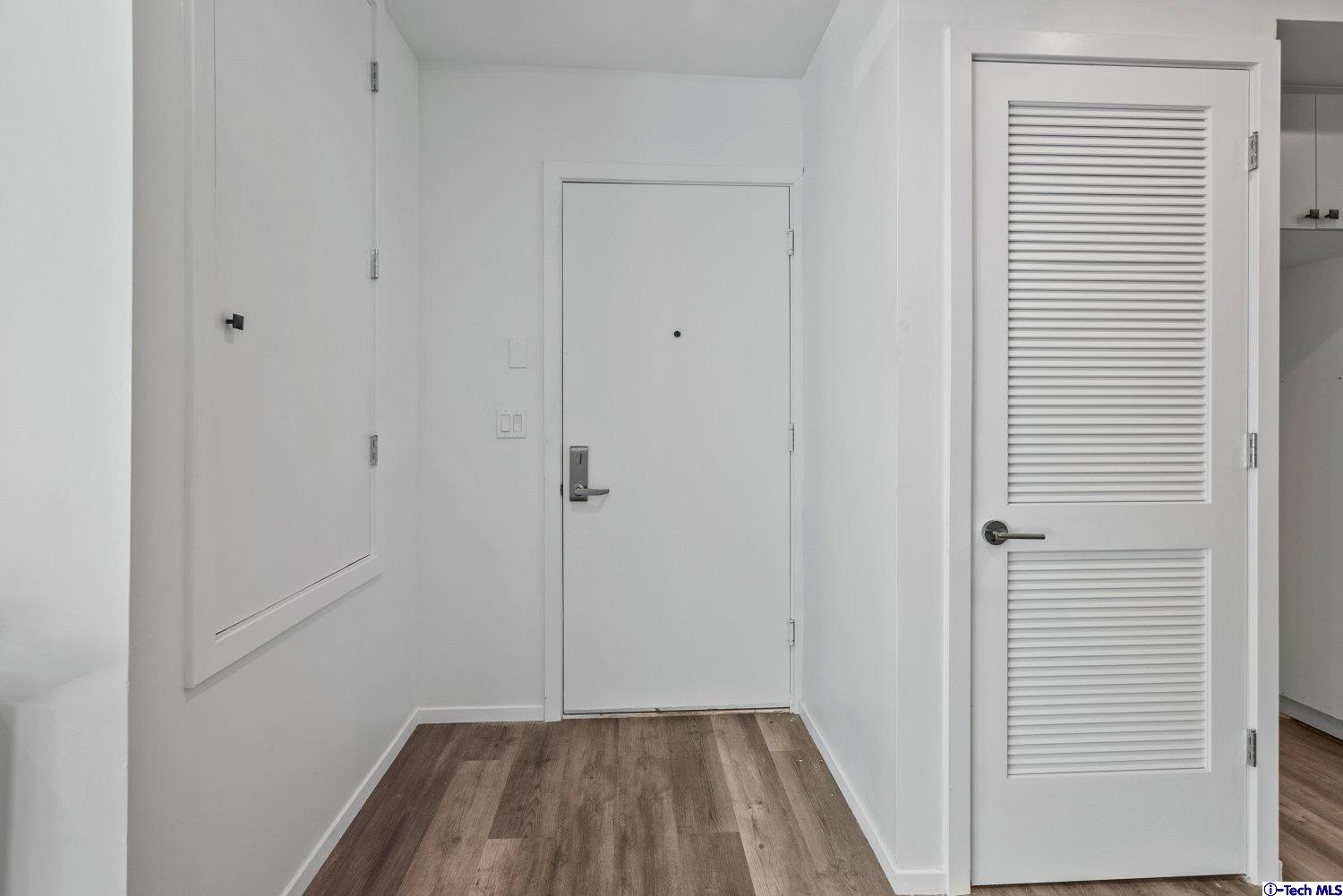 7064 Greeley Street, Unit 102 Tujunga, CA 91042 - Photo 6 of 27 a view of small space with wooden floor
