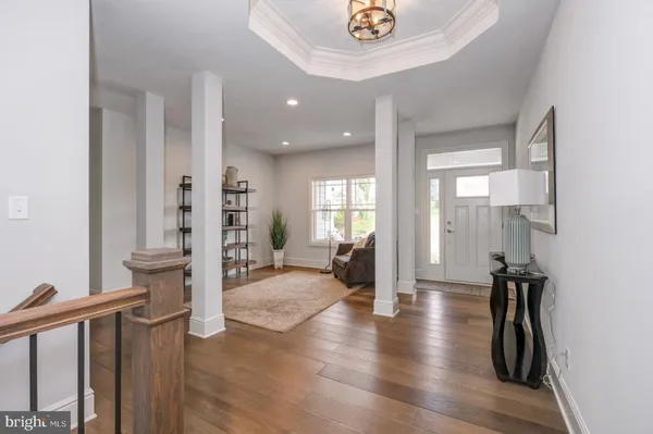 a view of a living room and a large window