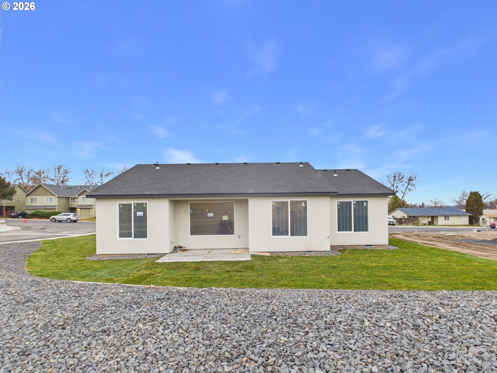 1291 Southeast 9th Street Hermiston, OR 97838 - Photo 19 of 34 a front view of a house with a yard