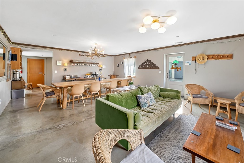 6790 West Pozo Road Santa Margarita, CA 93453 - Photo 12 of 68 a living room with furniture and a chandelier