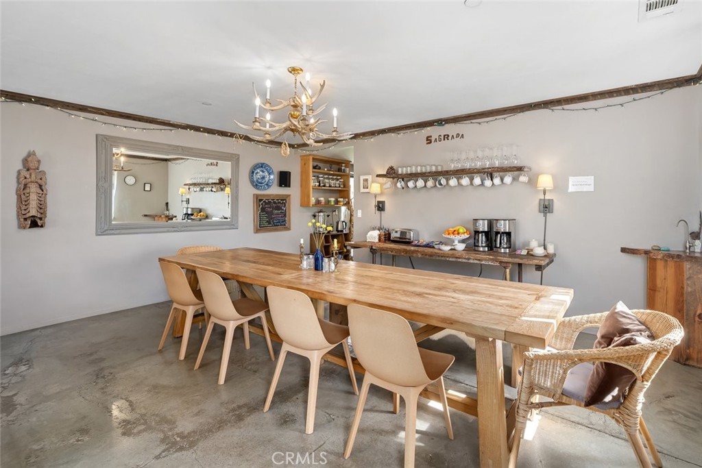 6790 West Pozo Road Santa Margarita, CA 93453 - Photo 13 of 68 a dining room with furniture and chandelier