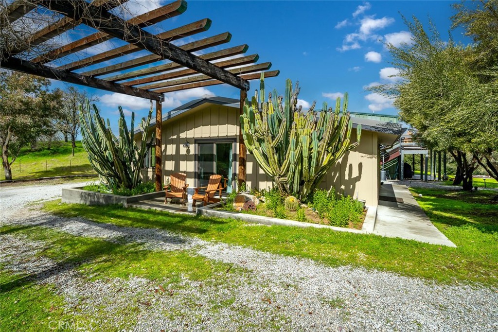 6790 West Pozo Road Santa Margarita, CA 93453 - Photo 24 of 64 a view of a house with a yard