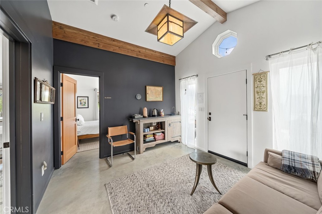 6790 West Pozo Road Santa Margarita, CA 93453 - Photo 30 of 68 a living room with furniture and a dining table