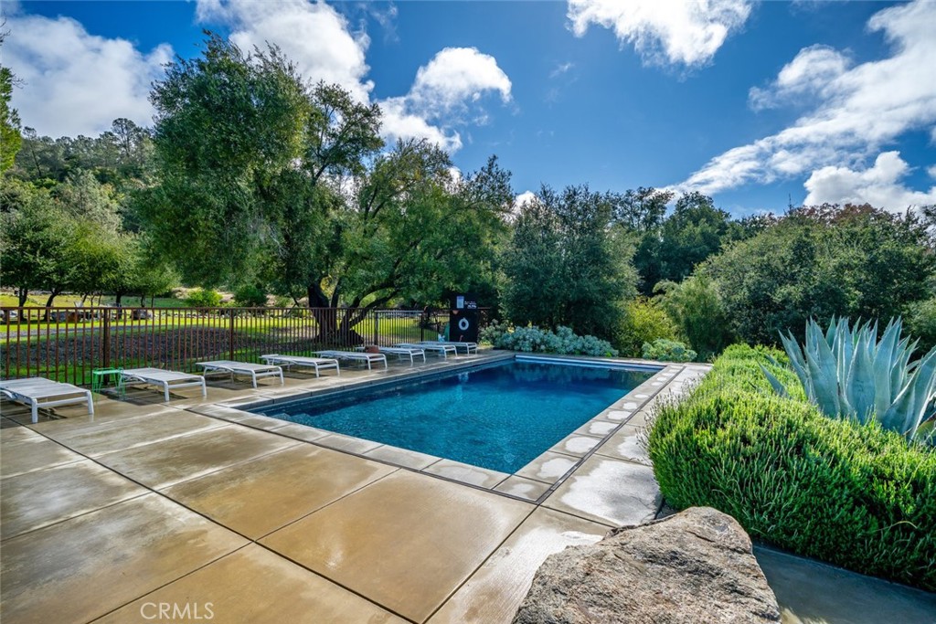 6790 West Pozo Road Santa Margarita, CA 93453 - Photo 3 of 68 a view of a swimming pool with a patio