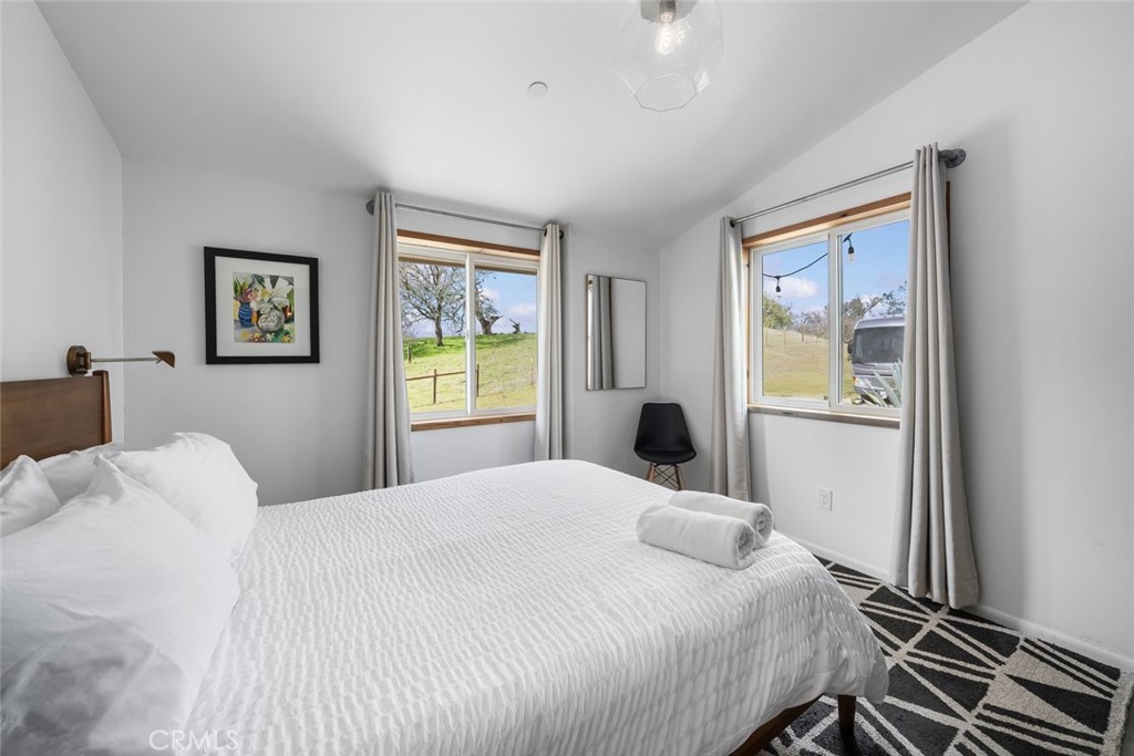 6790 West Pozo Road Santa Margarita, CA 93453 - Photo 32 of 68 a bedroom with a bed and a window