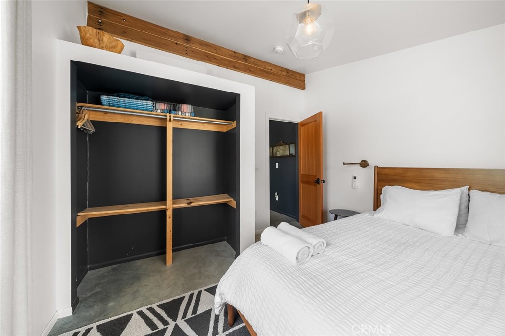 6790 West Pozo Road Santa Margarita, CA 93453 - Photo 33 of 68 a bedroom with a bed and a cabinets