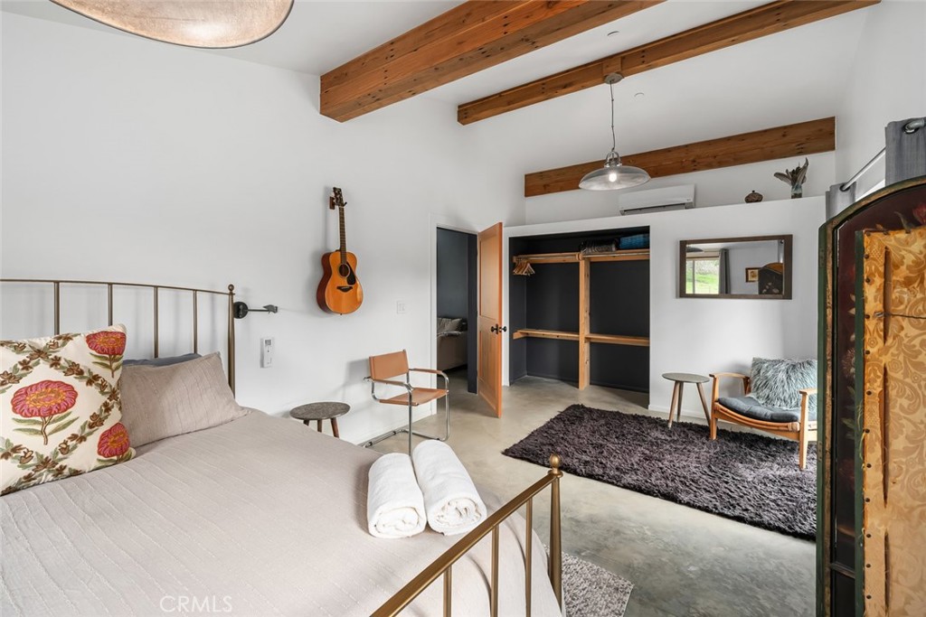 6790 West Pozo Road Santa Margarita, CA 93453 - Photo 37 of 68 a bedroom with furniture and a window