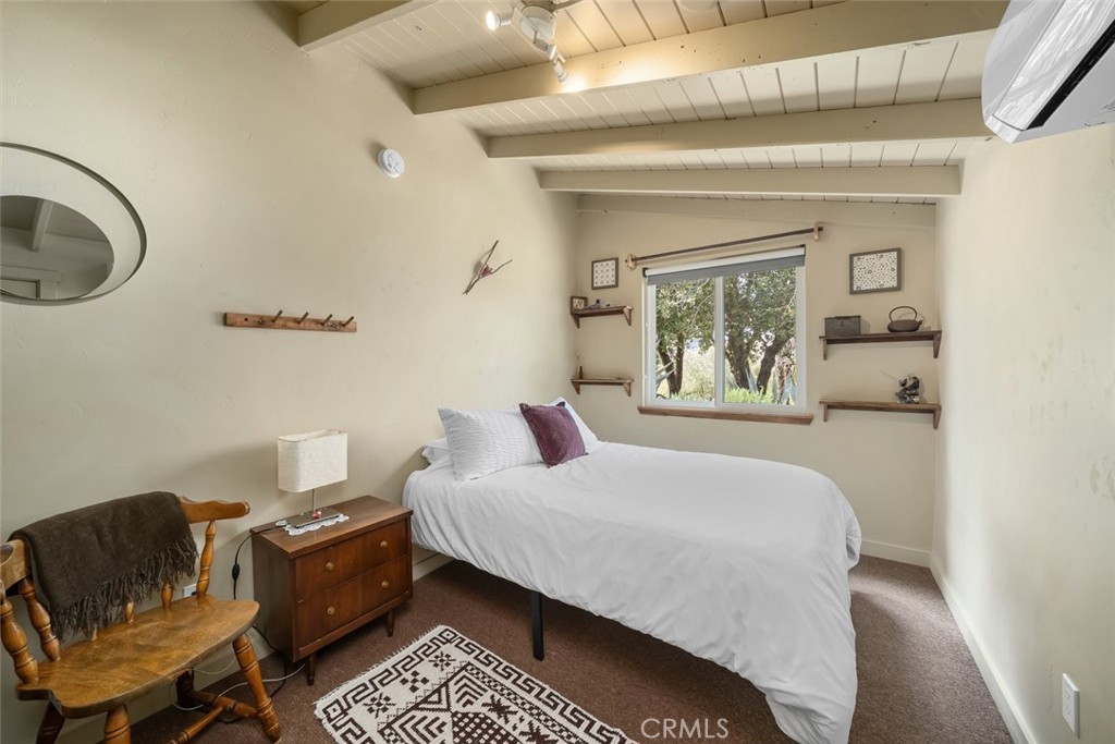 6790 West Pozo Road Santa Margarita, CA 93453 - Photo 59 of 64 a bedroom with a bed and window