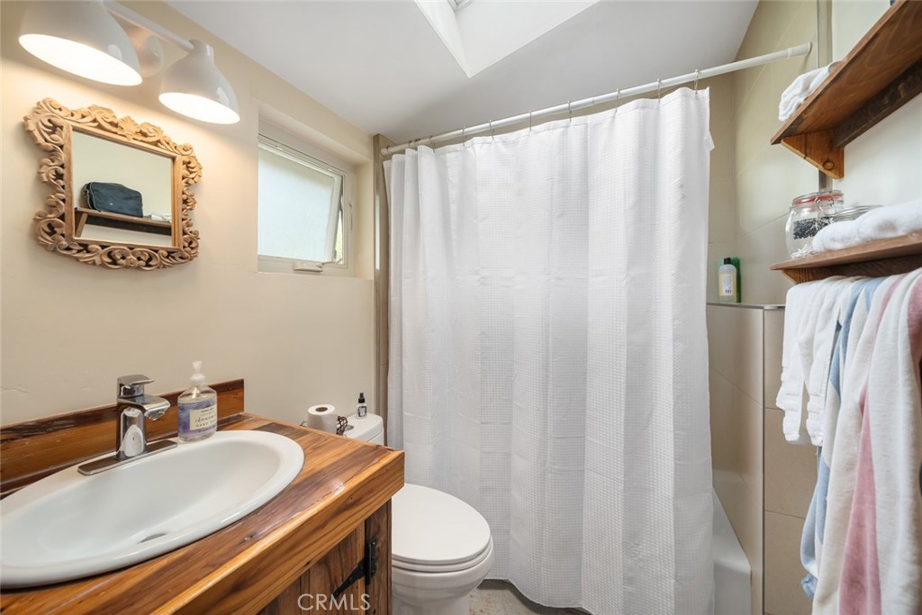 6790 West Pozo Road Santa Margarita, CA 93453 - Photo 62 of 68 a bathroom with a sink toilet and shower