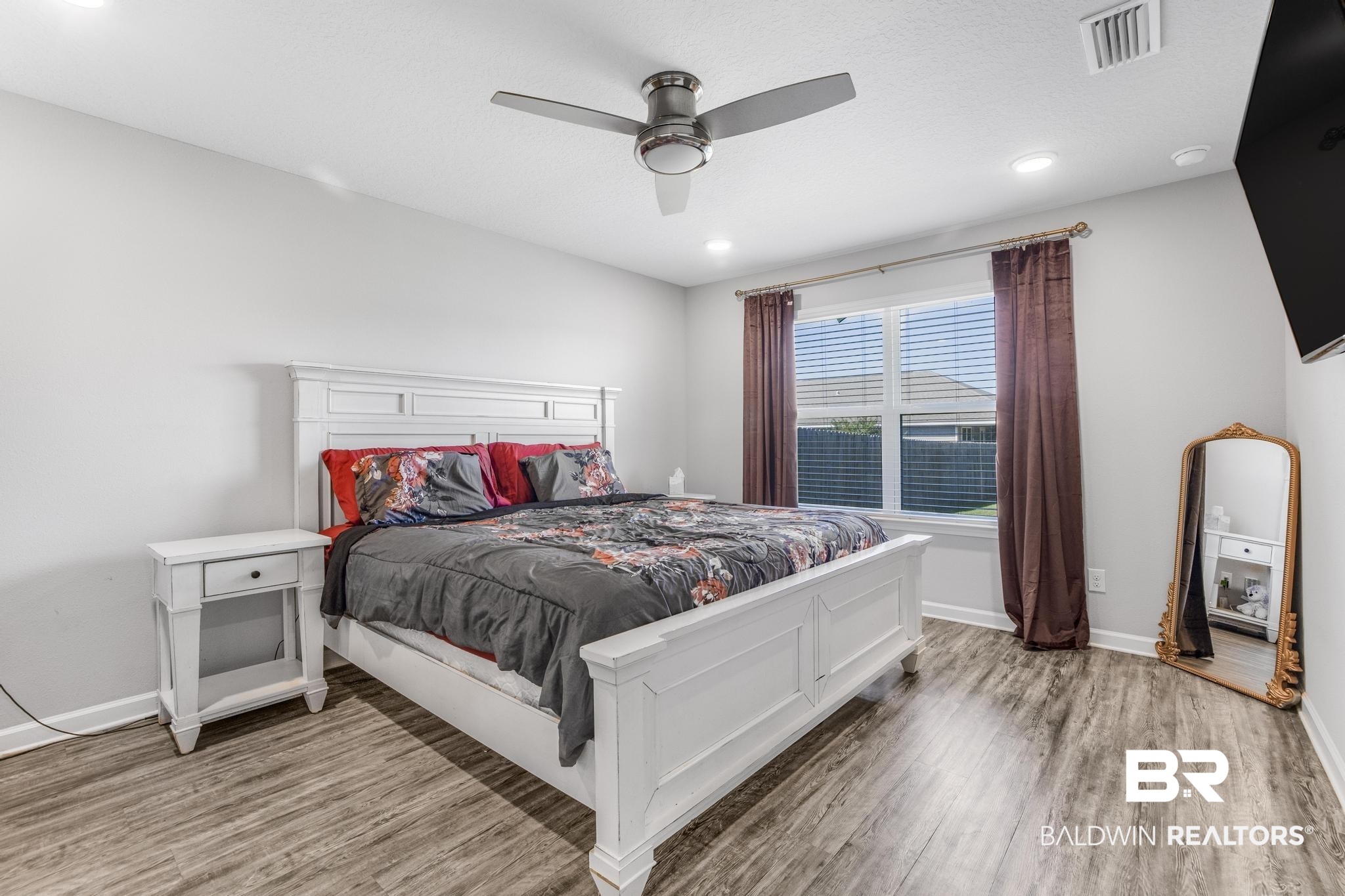 10738 Ridgeview Drive Mobile, AL 36608 - Photo 23 of 48 Bedroom with light wood-style flooring, a ceiling fan, and recessed lighting
