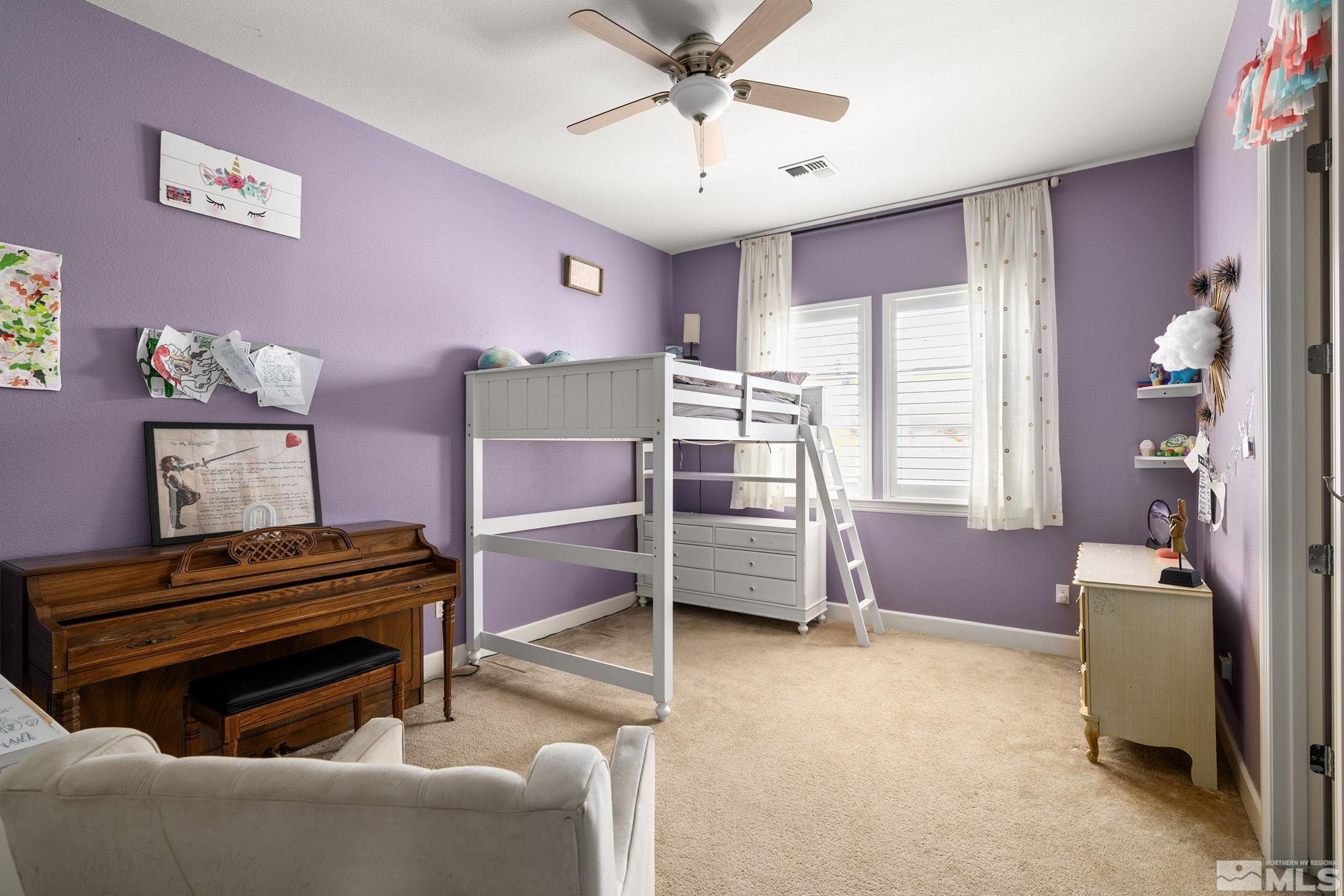 9820 Firefoot Lane Reno, NV 89521 - Photo 20 of 40 a bedroom with furniture and a window