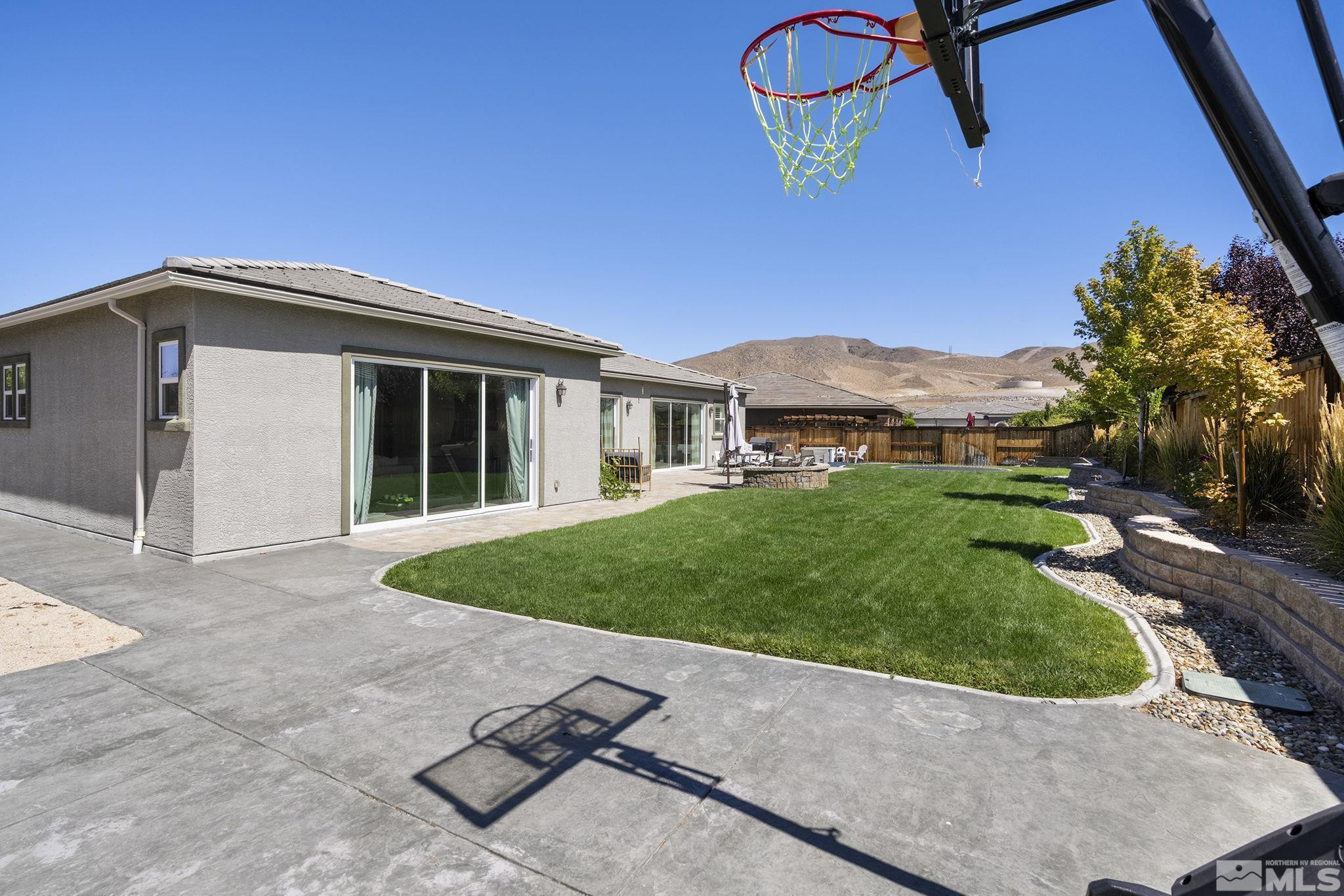 9820 Firefoot Lane Reno, NV 89521 - Photo 27 of 40 a view of a house with a backyard