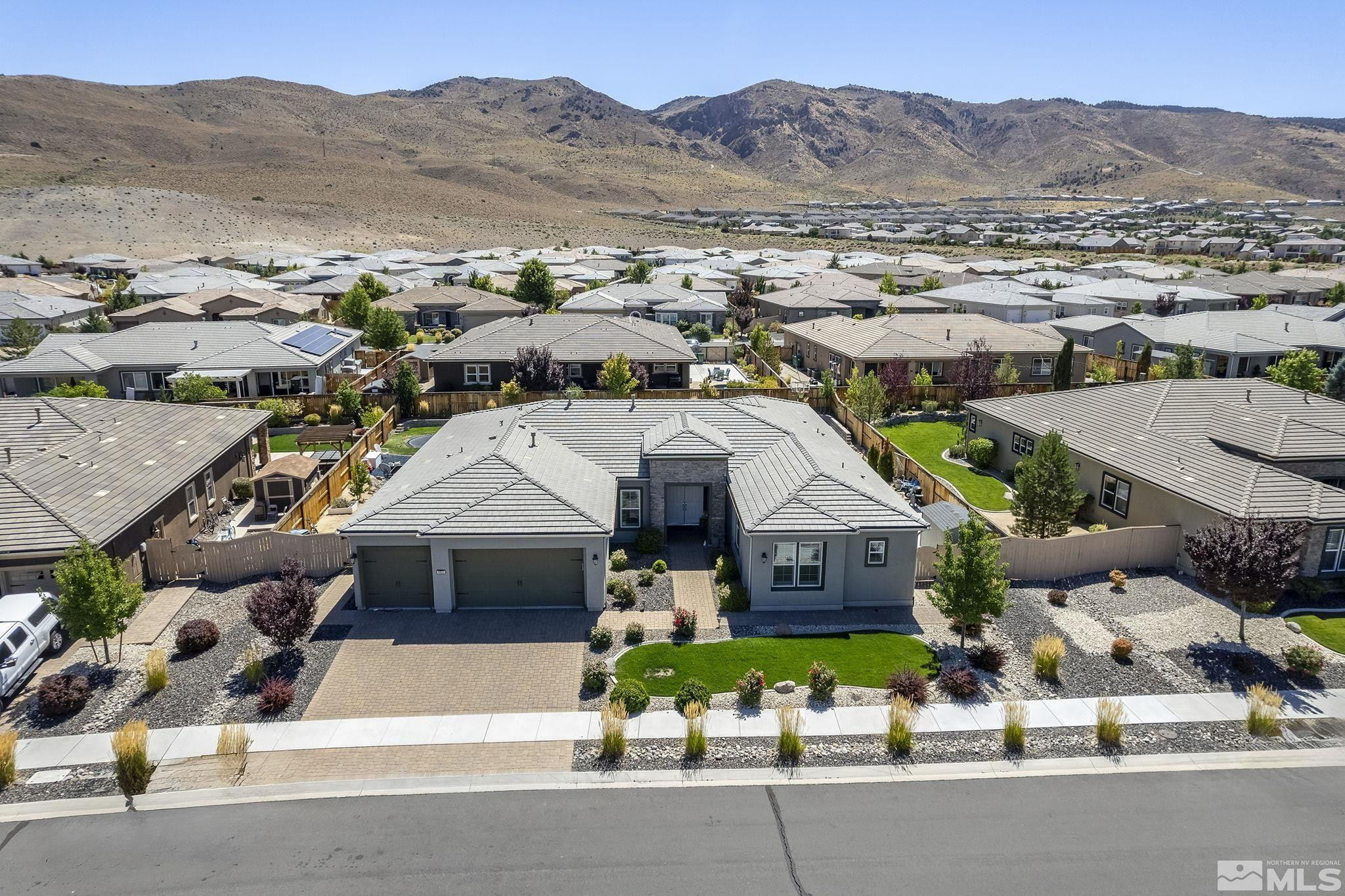 9820 Firefoot Lane Reno, NV 89521 - Photo 32 of 40 an aerial view of a house with a mountain