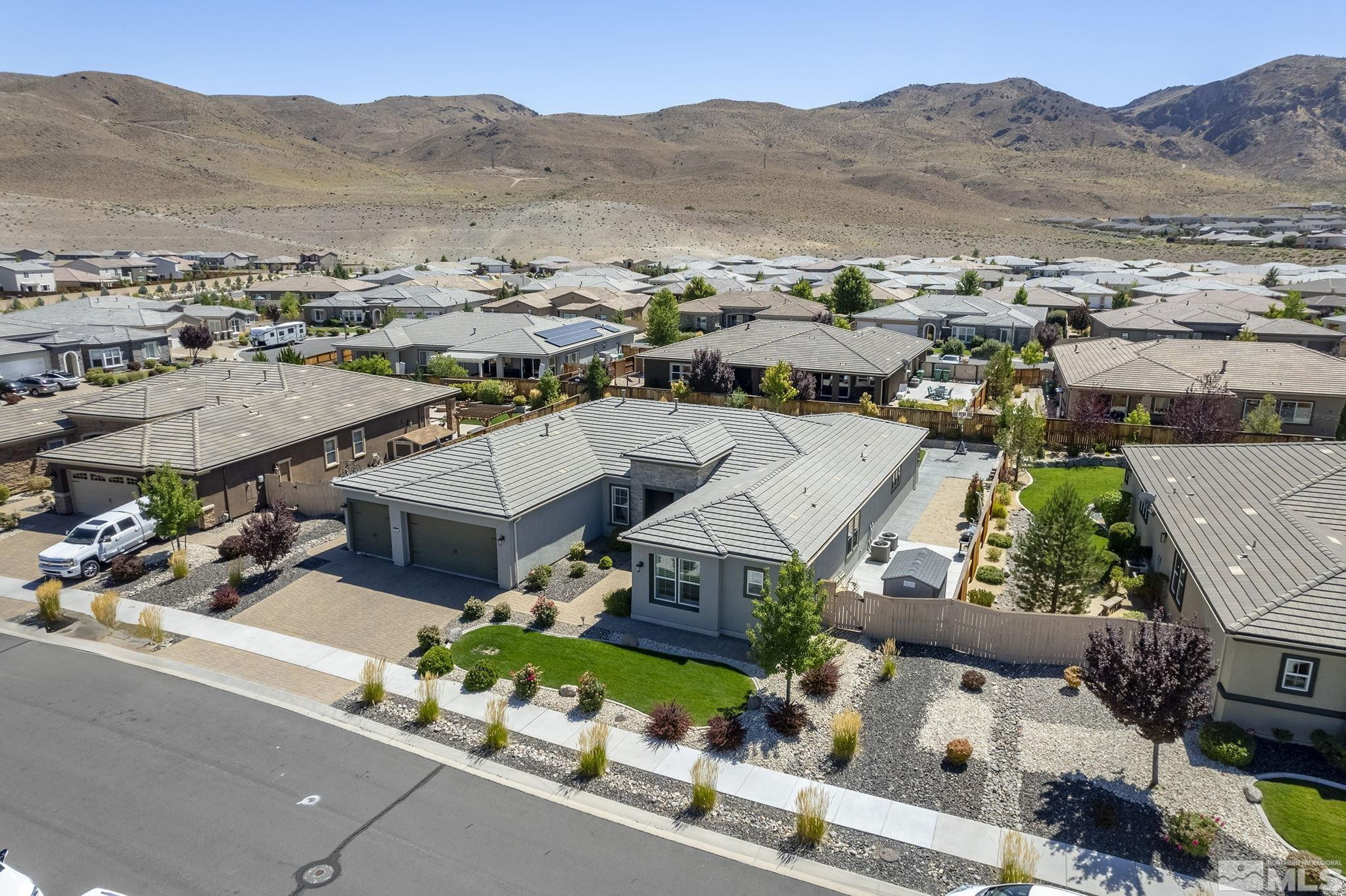 9820 Firefoot Lane Reno, NV 89521 - Photo 34 of 40 an aerial view of a house with a mountain