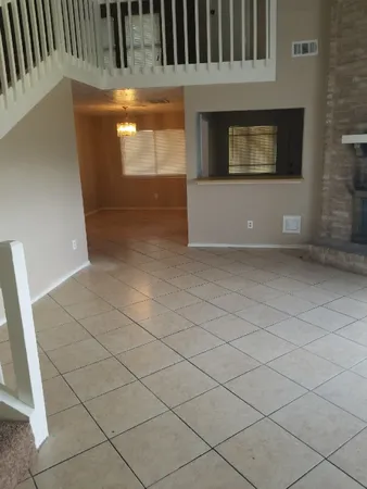 a view of a livingroom with a fireplace