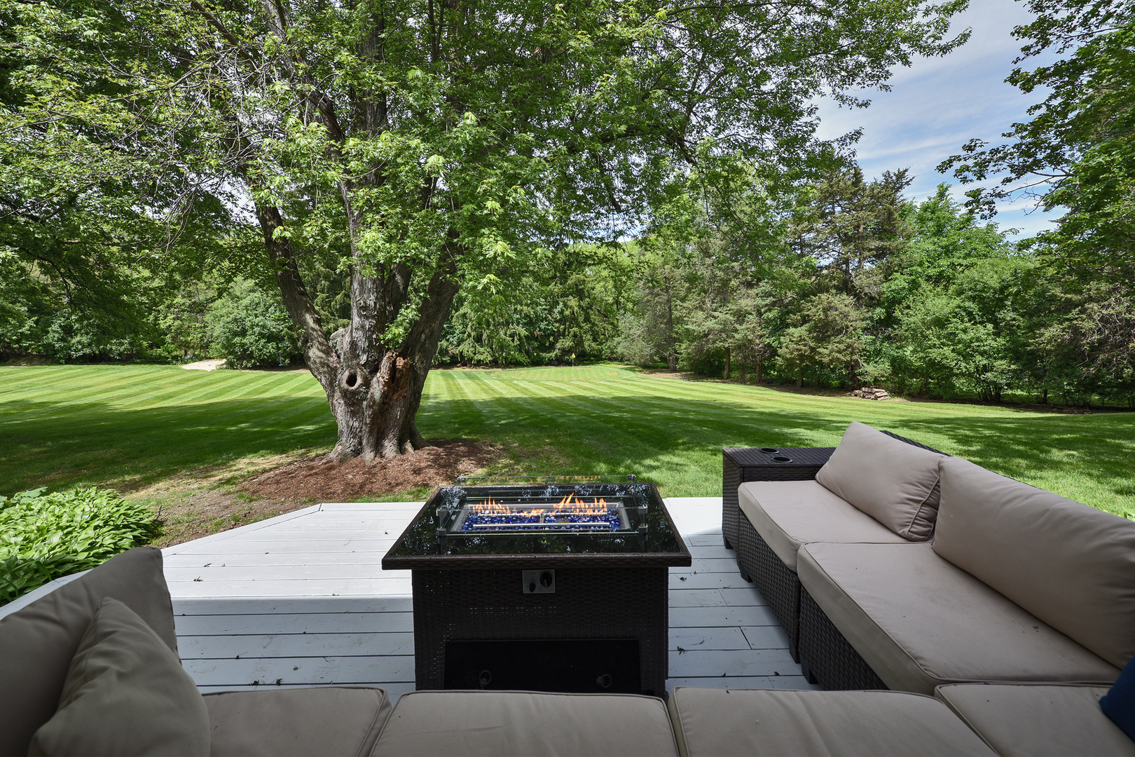 144 North Highland Road Inverness, IL 60067 - Photo 37 of 49 a view of a patio with couches and a big yard