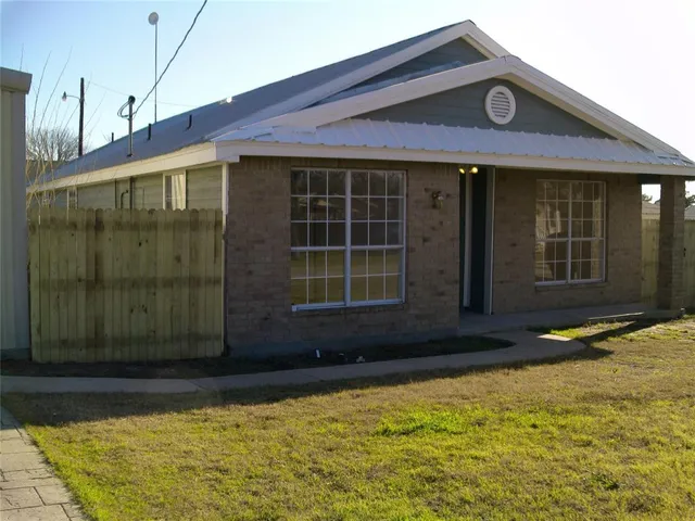a front view of a house having yard
