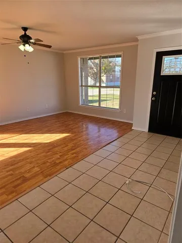 a view of an empty room and window