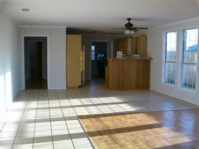 a view of a entryway door with living room
