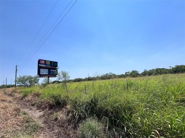 a view of a garden and lake