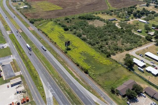 a view of swimming pool from a balcony