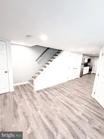 a view of a livingroom with wooden floor