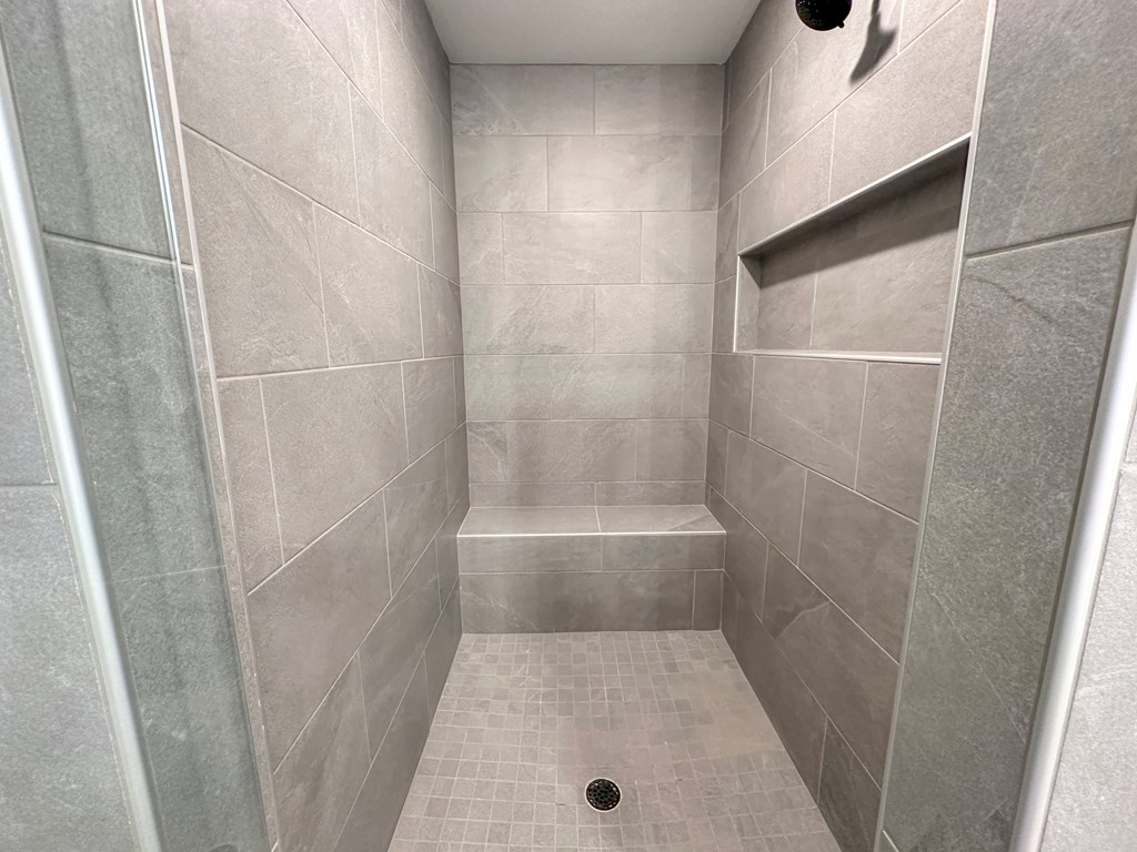 270 Young Lane Hamilton, GA 31811 - Photo 16 of 28 a bathroom with a glass shower door