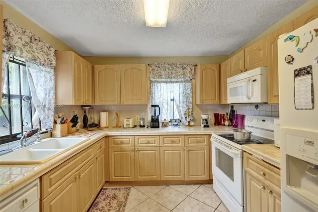 $560,000 | 3260 Northwest 174th Street, Miami Gardens, FL 33056