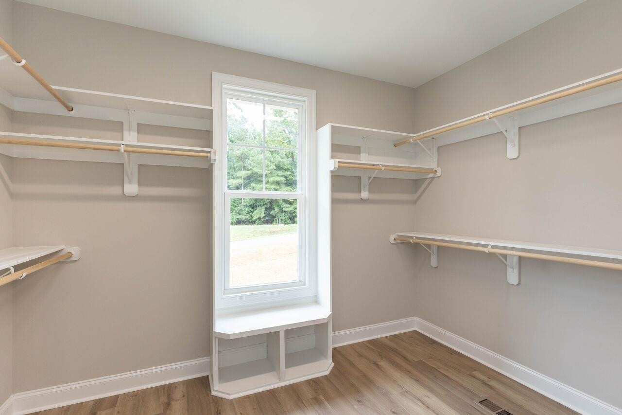 9616 Chris Drive Raleigh, NC 27603 - Photo 28 of 42 a view of an empty walk in closet