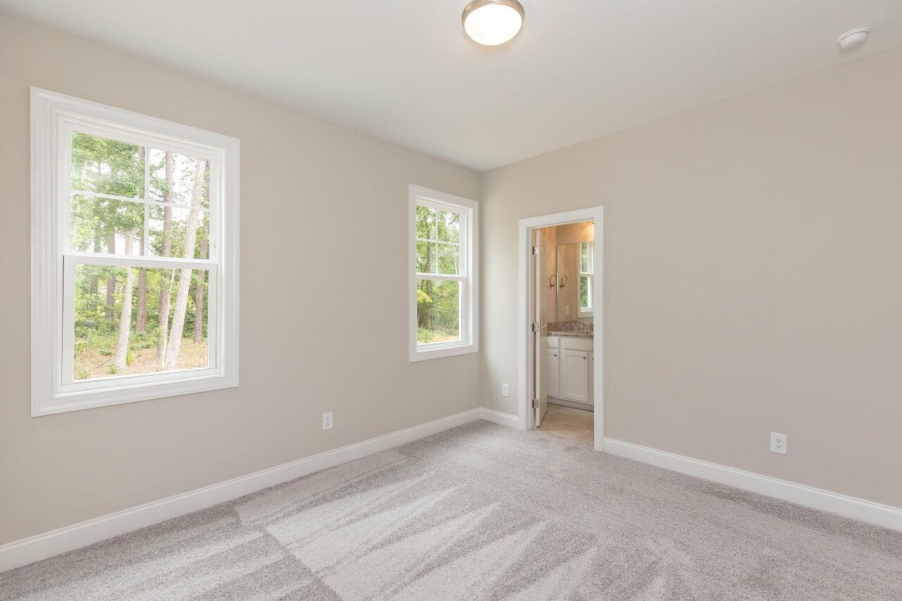 9616 Chris Drive Raleigh, NC 27603 - Photo 36 of 42 a view of an empty room with a window