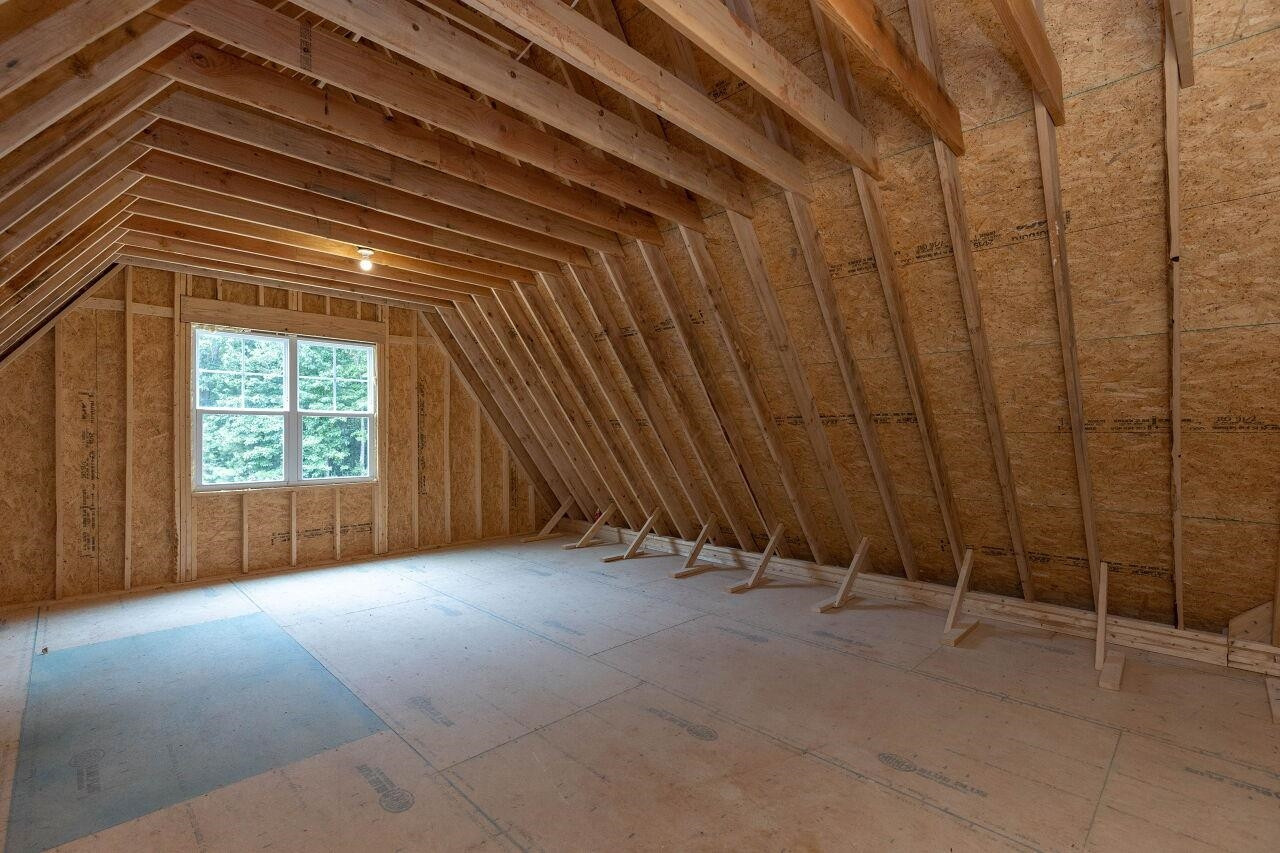 9616 Chris Drive Raleigh, NC 27603 - Photo 40 of 42 an empty room with windows