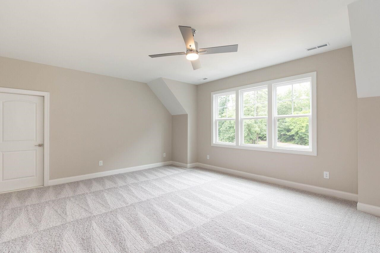 9616 Chris Drive Raleigh, NC 27603 - Photo 5 of 42 a view of an empty room with a window