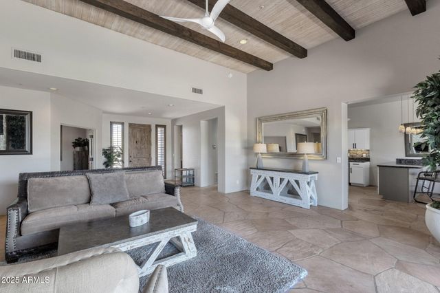 a kitchen with stainless steel appliances granite countertop a stove and a sink