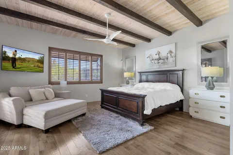 a bathroom with a sink vanity and mirror