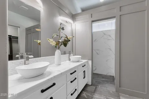 a building outdoor space with patio furniture and potted plants