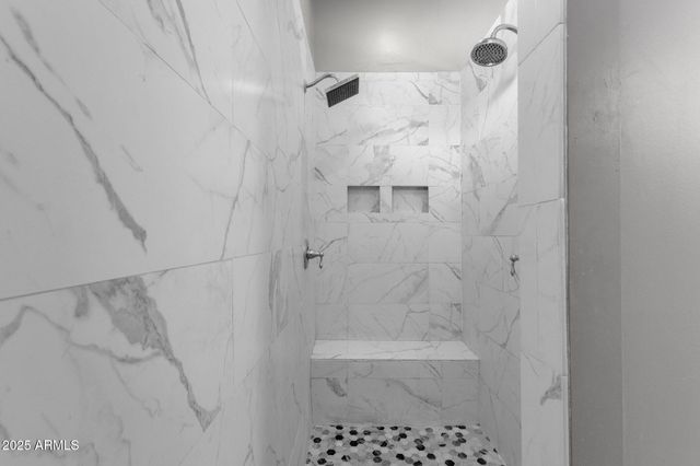 a view of chairs and table in the patio