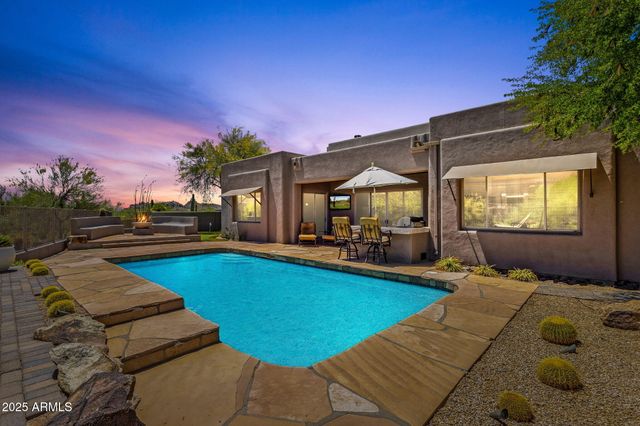 a view of a patio with a stove top oven and sink
