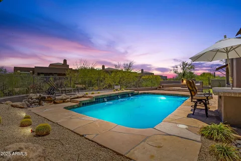 a view of a bench in a backyard