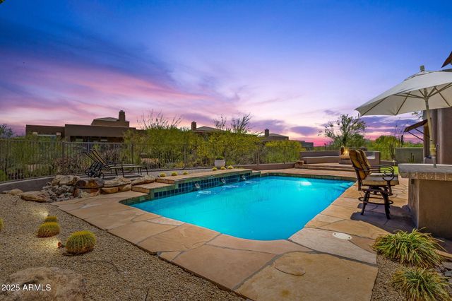 a view of a bench in a backyard